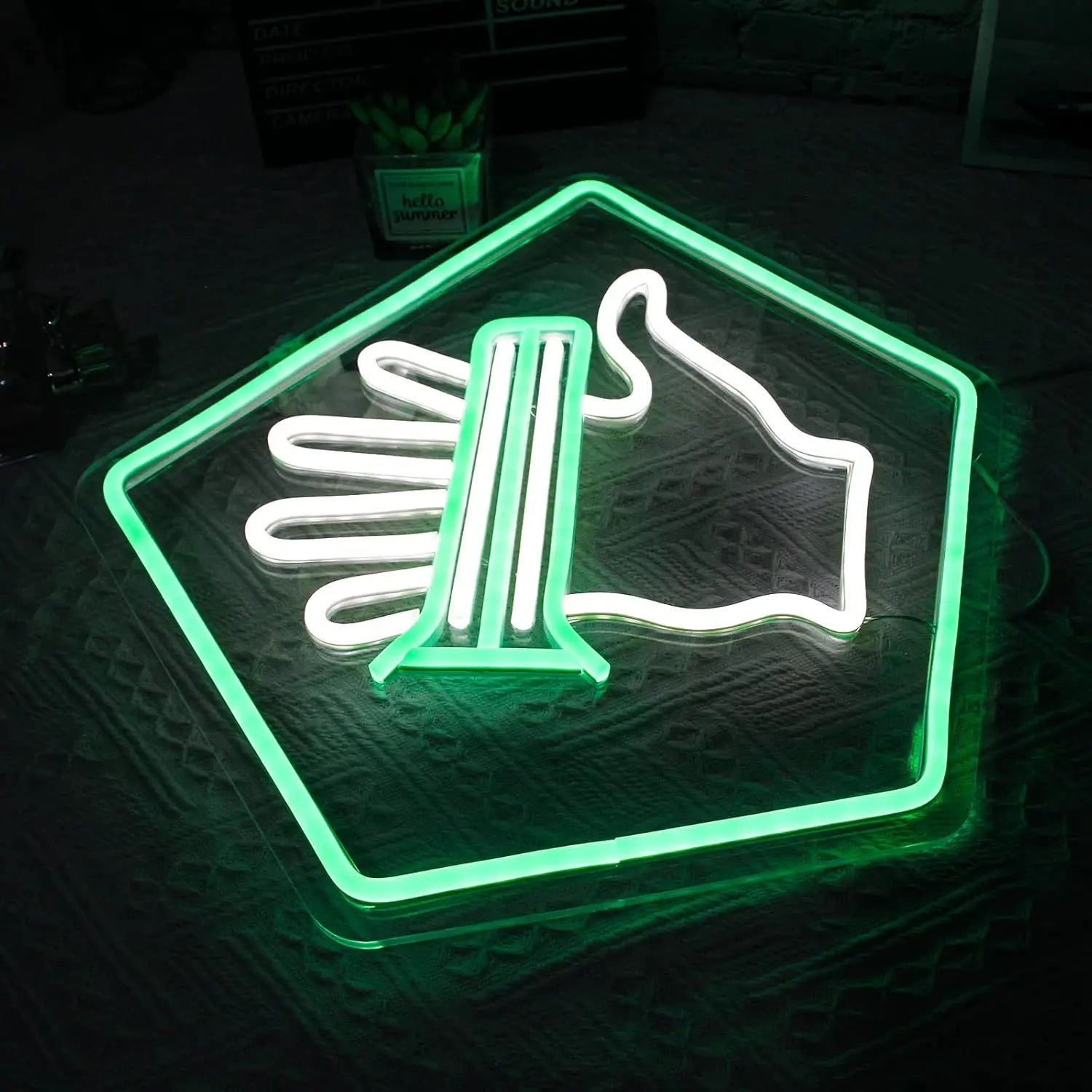 Green and white LED neon sign inspired by the Speed Cola perk from Call of Duty Zombies, featuring a stylized hand inside a glowing hexagon frame, perfect for gaming room wall decor.